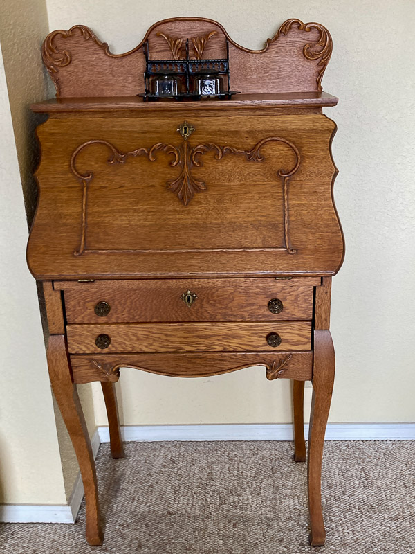 Antique secretary and inkwell